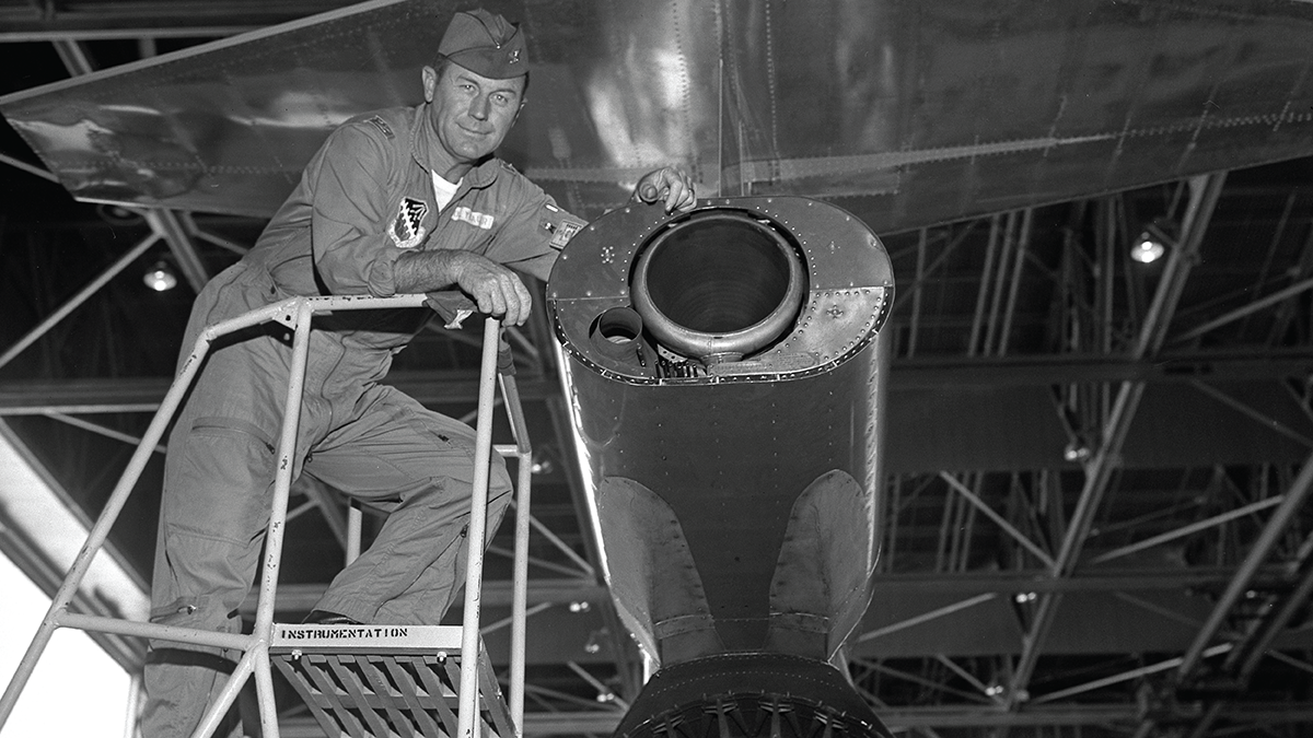 Chuck Yeager checks the rocket installation on a Lockheed Starfighter at Edwards Air Force Base, 1963.